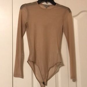 Tan sheer body suit